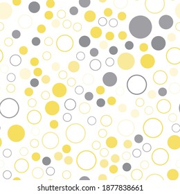 Yellow and gray dots. Seamless pattern. Polka dot design for print on fabric. Vector illustration.