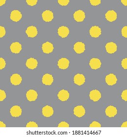 Yellow and gray seamless polka dot pattern, vector illustration. Seamless pattern with yellow rough circles on gray. Abstract geometric background