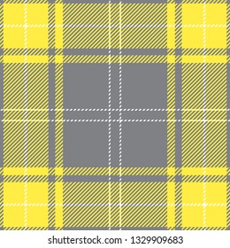 Yellow and gray tartan plaid. Trendy Scottish cage textile pattern.