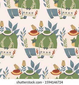 yellow and green christmas sweaters with decorations and flowers in a seamless pattern design, perfect to use on the web or in print