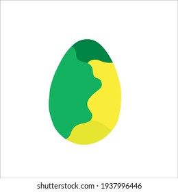 Yellow and green easter egg on white background isolated