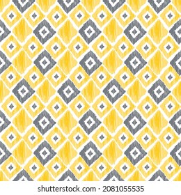 Gelbe und graue ethnisch nahtlose Muster. Ikat abstrakte geometrische Vektorgrafik.