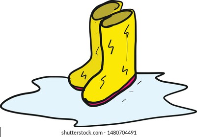 Yellow Gumboots With Lightning Bolts In Rain Puddle