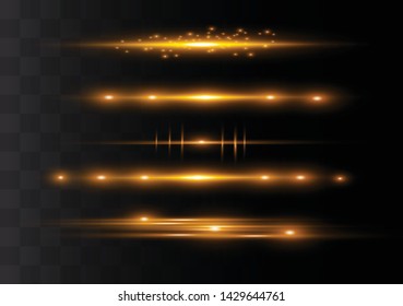 yellow horizontal lens flares pack. Laser beams, horizontal light rays.Beautiful light flares. Glowing streaks on dark background. Luminous abstract sparkling lined background.