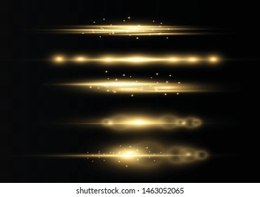 yellow horizontal lens flares pack. Laser beams, horizontal light rays.Beautiful light flares. Glowing streaks on dark background. Luminous abstract sparkling lined background.