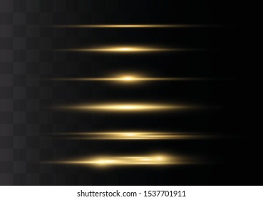 yellow horizontal lens flares pack. Laser beams, horizontal light rays. Beautiful light flares. Glowing streaks on dark background. Luminous abstract sparkling lined background.