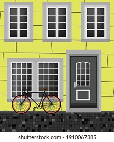 Casa amarilla con ventanas grises y una puerta. Ilustración vectorial de una casa con una bicicleta. Casa de ladrillo con calle de piedra. Diseño para postales, afiches, textiles, menús, banners, sitios web, fondos.