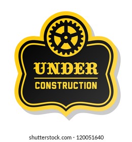 yellow label under construction with gear