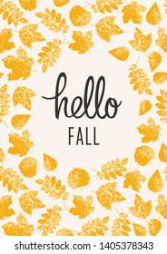 Yellow leaves around Hello fall lettering on a light-beige background