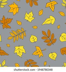 Yellow leaves on a gray background. Seamless pattern. Vector illustration.
