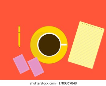 Yellow leaves, pen and brown, envelopes of sugar substitutes, on an orange background, in zenith position