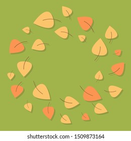 yellow leaves round frame on green grass background