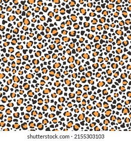 Yellow leopard print seamless vector design.  Color decorative vector illustration for print card fabric or wallpaper. Modern ornament of stylized skin.