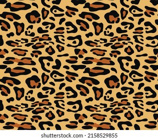 
yellow leopard print vector spots seamless design for clothes, fabric, paper.