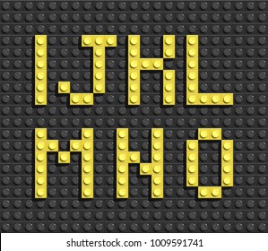 Yellow Letters Of Alphabet From Black Building Lego Bricks Background. Lego Bricks Letters. Lego Alphabet