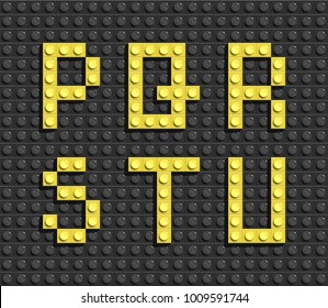 Yellow Letters Of Alphabet From Black Building Lego Bricks Background. Lego Bricks Letters. Lego Alphabet