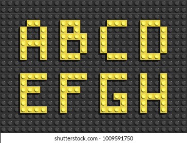 Yellow Letters Of Alphabet From Black Building Lego Bricks Background. Lego Bricks Letters. Lego Alphabet