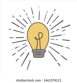 Yellow light bulb in doodle style. Hand drawn illustration. vector
