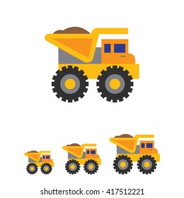 Yellow loaded dump truck