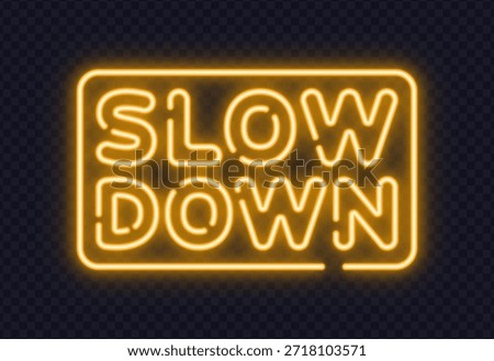 Yellow neon slow down sign with rounded frame, designed for traffic concepts and safety messages. Warm glow adds visibility and calm mood to dark backgrounds.