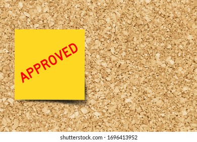 Yellow note with word approved on cork board background  with copy space (Vector)