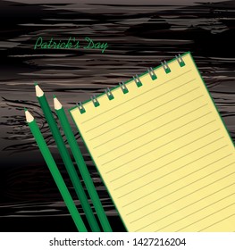 Yellow notebook with template hand-drawn Green festive bunting with clover and pencil. Irish holiday - Happy St. Patrick's Day with a garland of three-leaf. Greeting card on holiday. Vector on wooden