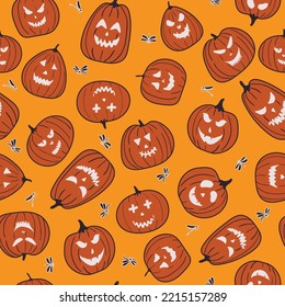 Yellow and orange Halloween repeat background with pumpkins and dragonflies. Perfect for gift wrapping, scrapbooking, wallpaper