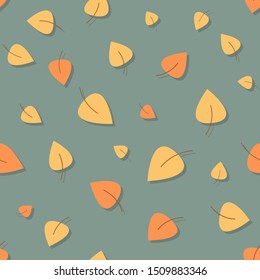 yellow, orange leaves seamless pattern on grey blue background. autumn