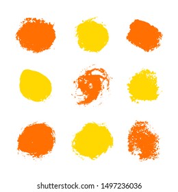 yellow, orange vector brush strokes circles of paint on white background 