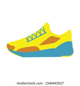 Yellow pair of gym shoes on a white backdrop