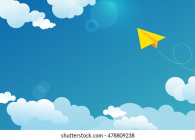 Yellow paper airplane in the sky with clouds.