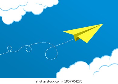 Yellow paper plane flying on blue sky with clouds. Concepts: the way forward, unique, innovation, start-up company, business, growth, travel, freedom, dream, idea, creativity.