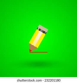yellow pencil on a green background