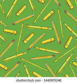Yellow pencils and brushes seamless pattern on green background