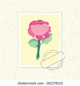yellow postage stamp with rose and postmark
