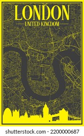 Yellow printout streets network map with city skyline of the downtown LONDON, UNITED KINGDOM on a black framed background