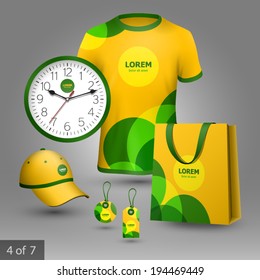 Yellow promotional souvenirs design for company with green circles. Elements of stationery.