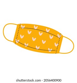 Yellow protective mask with a heart pattern isolated on a white background.