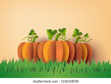  yellow pumkin on the green field , Paper art and craft style.