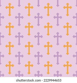 Yellow and purple crucifix on pink background. Christian symbol seamless pattern. For textile, wrapping paper, packaging.