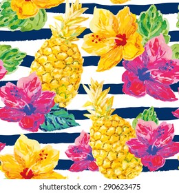 Yellow and purple hibiscuses with leaves and pineapples on the striped background. Watercolor seamless pattern with tropical flowers and fruits.