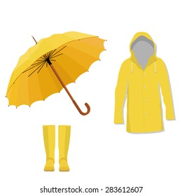 Yellow raincoat, rubber boots and opened umbrella. Fashion, protection