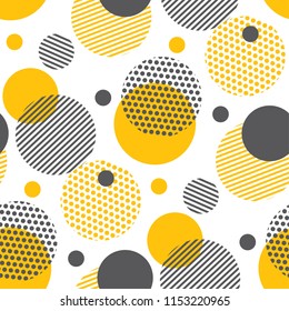 Yellow random round geometry seamless pattern. Vector illustration surface design for print and web. Memphis post-modernist style motif. Pop art repeatable fabric sample.
