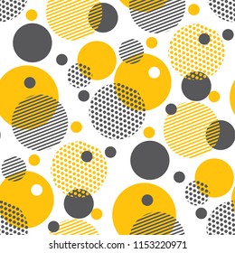 Yellow random round geometry seamless pattern. Vector illustration surface design for print and web. Memphis post-modernist style motif. Pop art repeatable fabric sample.
