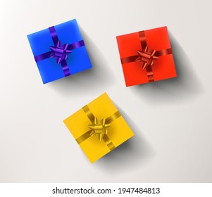 Yellow, red and blue gift boxes isolated on white background