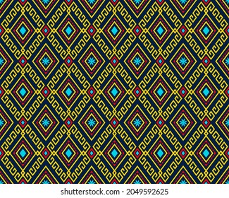 Yellow Red Tribe or Ethnic Seamless Pattern on Blue Background in Symmetry Rhombus Geometric Bohemian Style for Clothing or Apparel,Embroidery,Fabric,Package Design