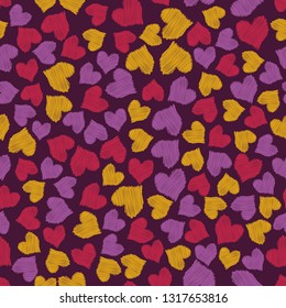 Yellow, red, violet scribble hearts seamless pattern on dark background. Vector illustration for design textile, wrapping paper, card, banner, wallpaper