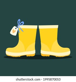 botas de goma amarillas. ilustración vectorial. Imagen aislada en un fondo verde.