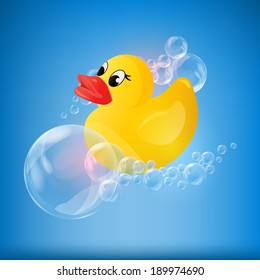 Yellow rubber duck in bubbles