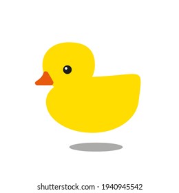Yellow rubber duck with orange beak and shadow isolated on white background